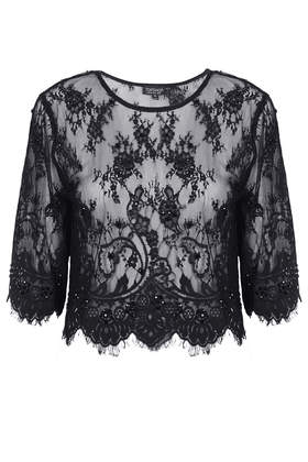 Top court fantaisie en dentelle – 46 €